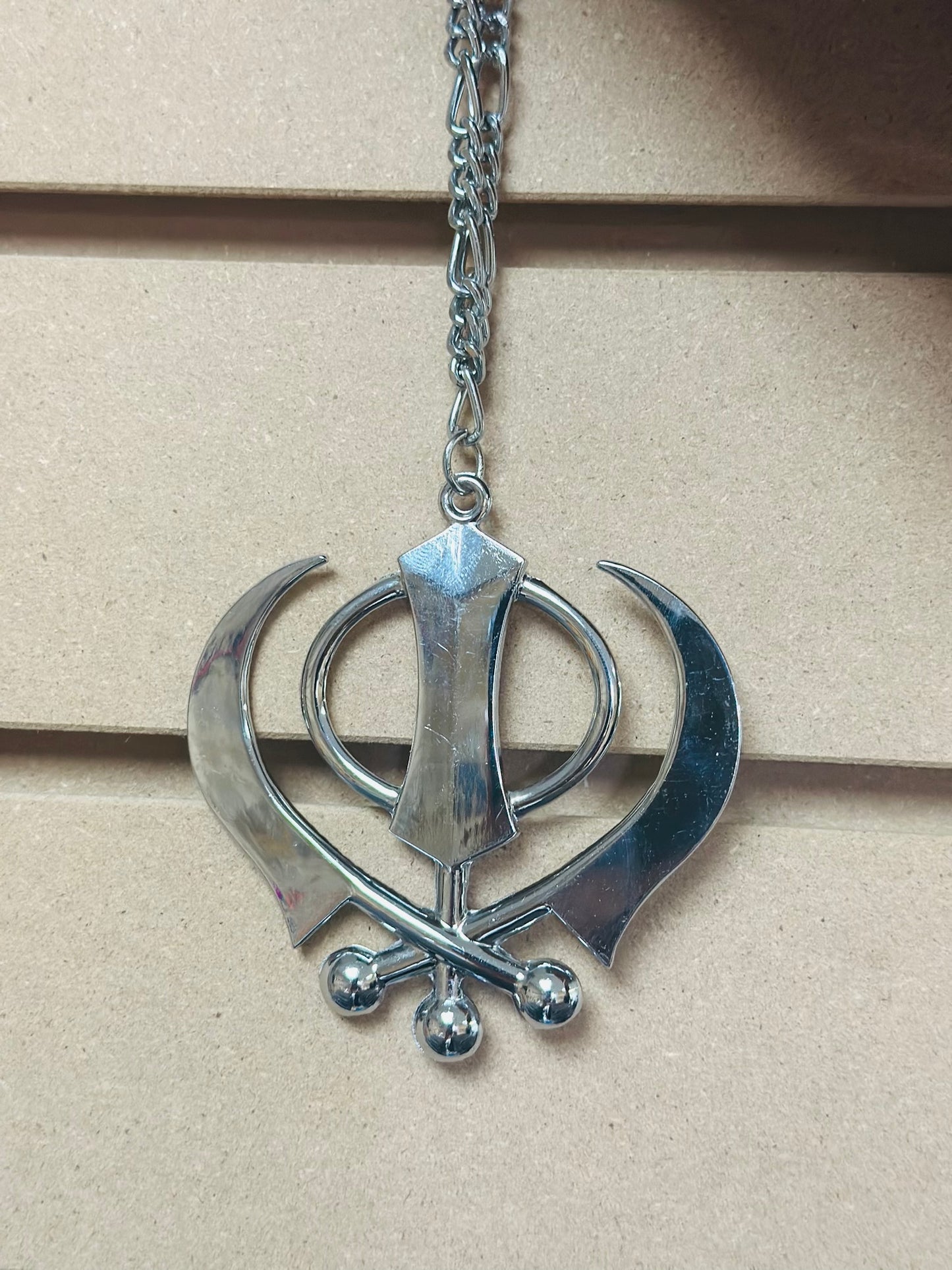 Khanda hanging